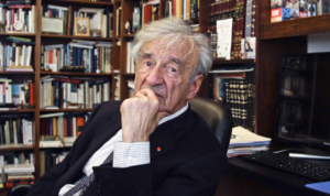 Author and Nobel Laureate Elie Wiesel surrounded by books.