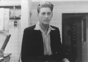 Edgar Krasa stands in the kitchen where he volunteered as an apprentice.